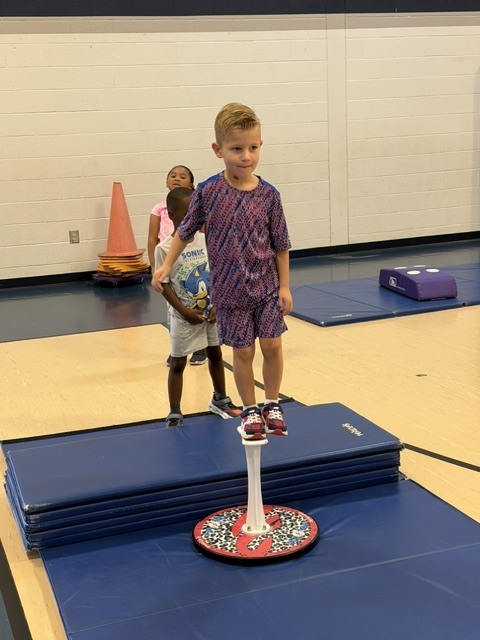 Douglasville Gymnastics Showing skills in PE