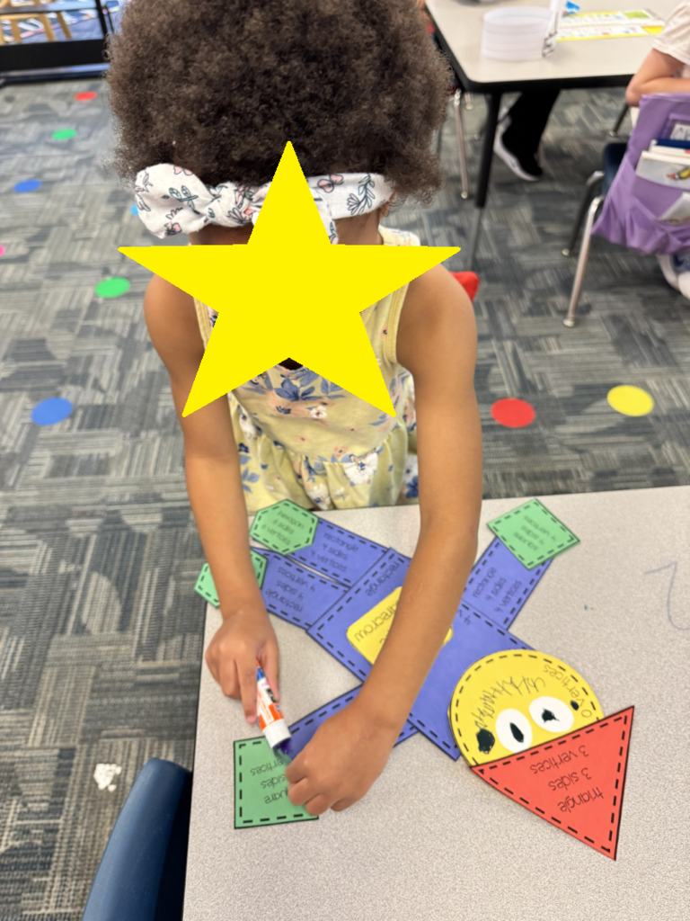 students building scarecrows with various shapes