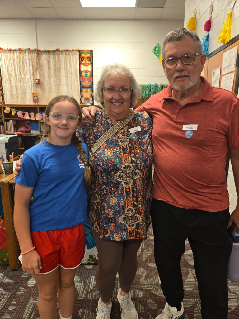grandparents shopping at the book fair