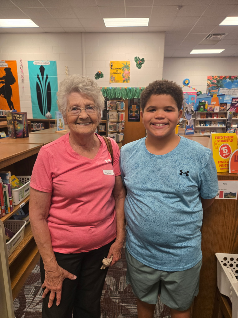 grandparents shopping at the book fair