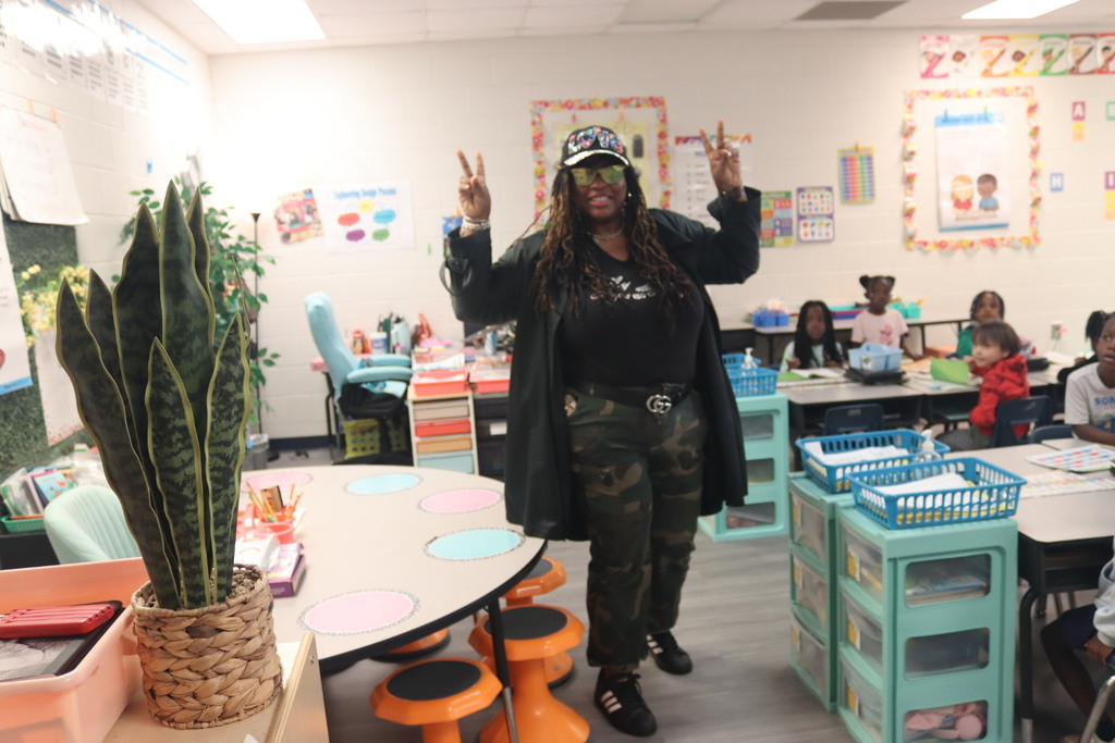 children and teachers dressed as glam or paparazzi