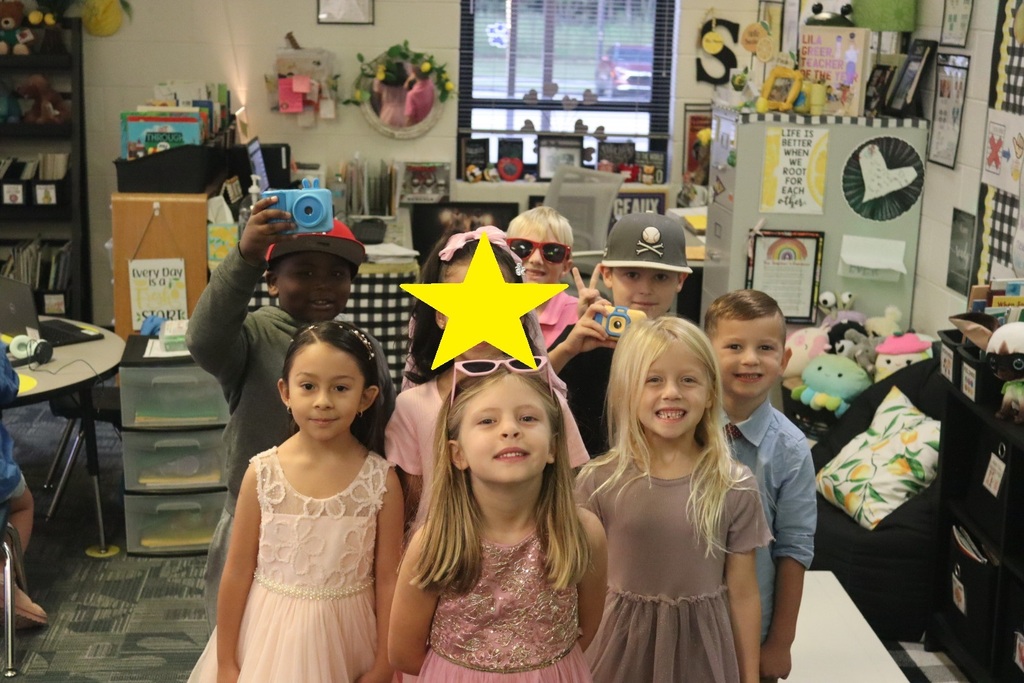 children and teachers dressed as glam or paparazzi