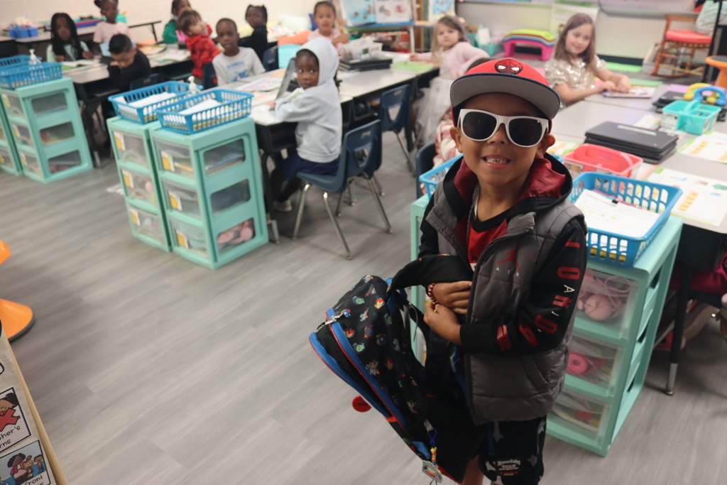 children and teachers dressed as glam or paparazzi