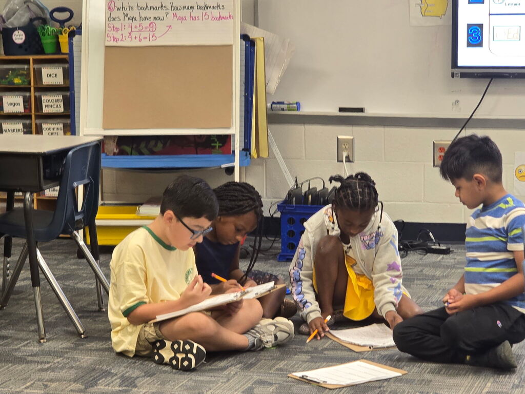 2nd graders working and playing