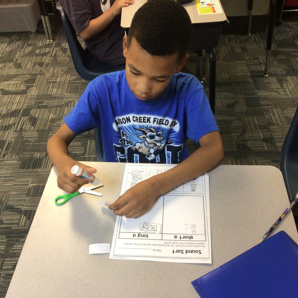 2nd graders working and playing