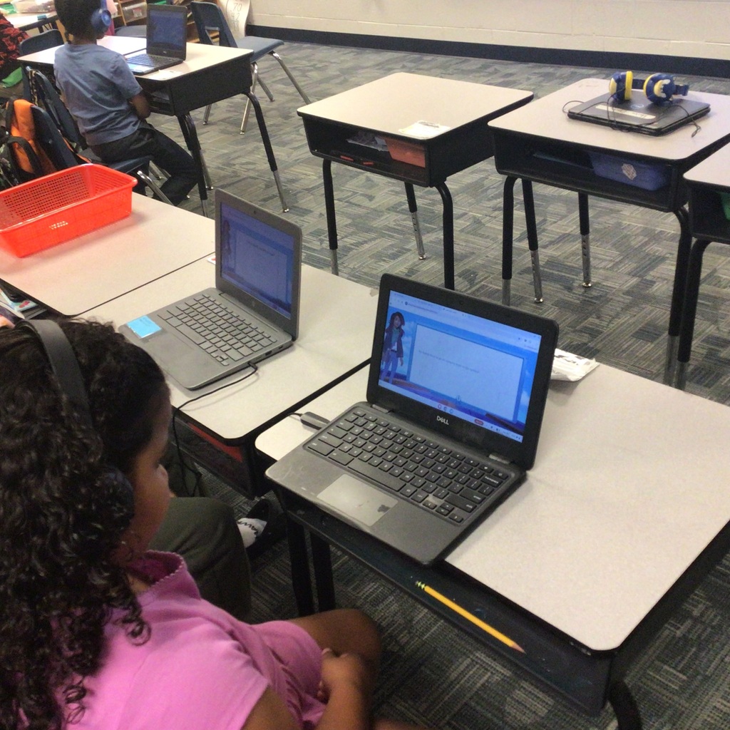 2nd graders working and playing