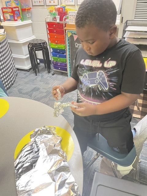 students learning and playing