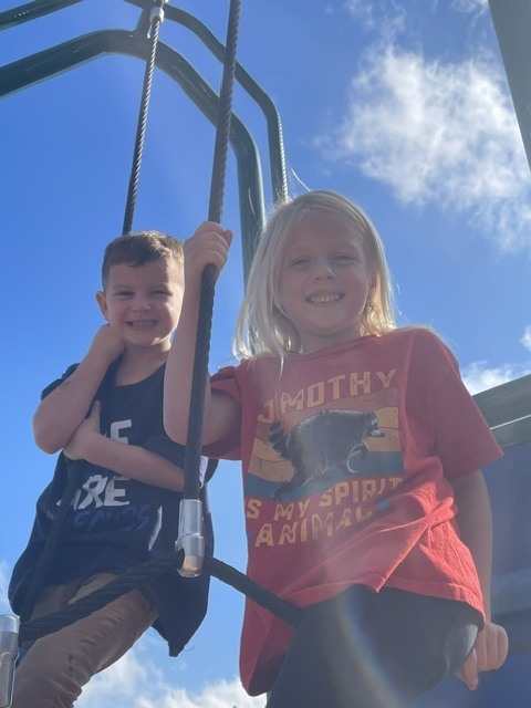 students learning and playing