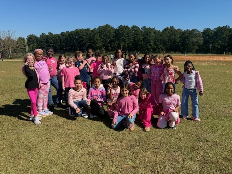 Pink out, parade, strawberry plants