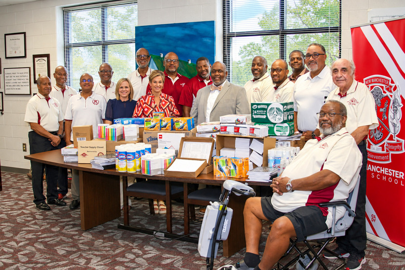 Supply Closet Donation group photo at NMHS.