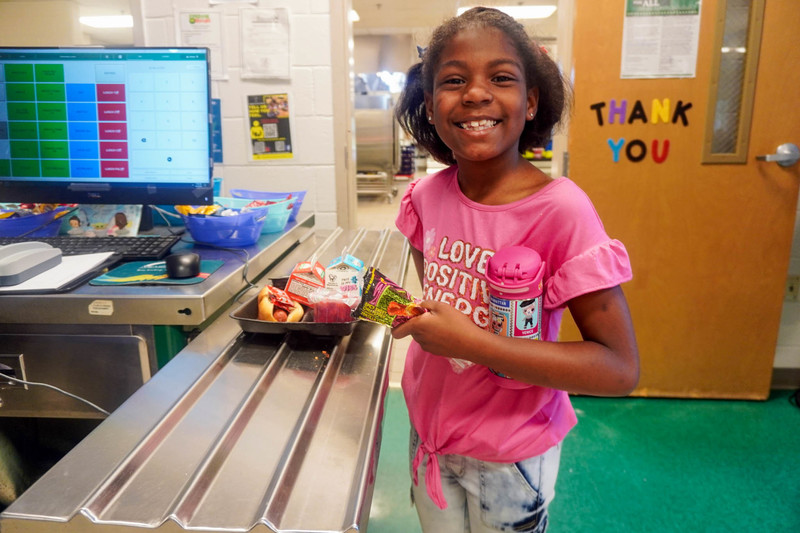 A student with her school lunch