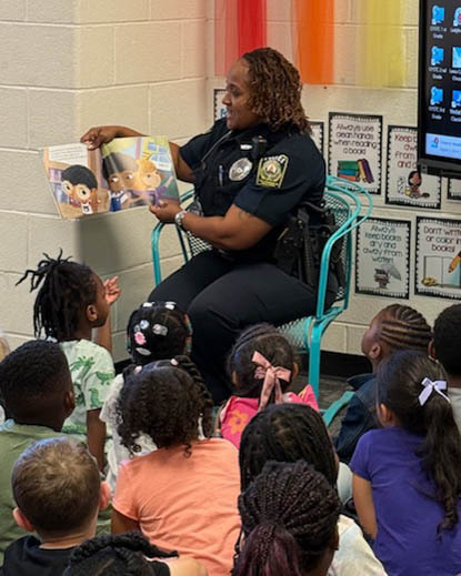 MLES SRO reads to students