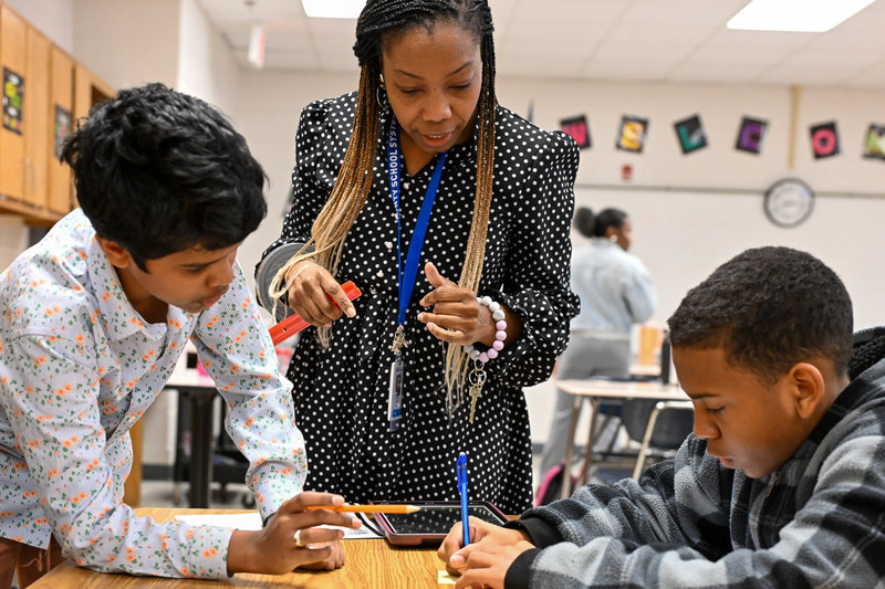 Students and a teacher work on a STEM  project at Factory Shoals Middle School.