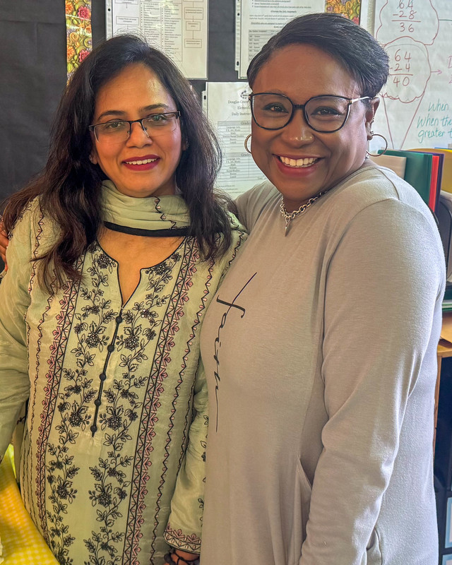 Rahmath Sultana is pictured with another staff member.