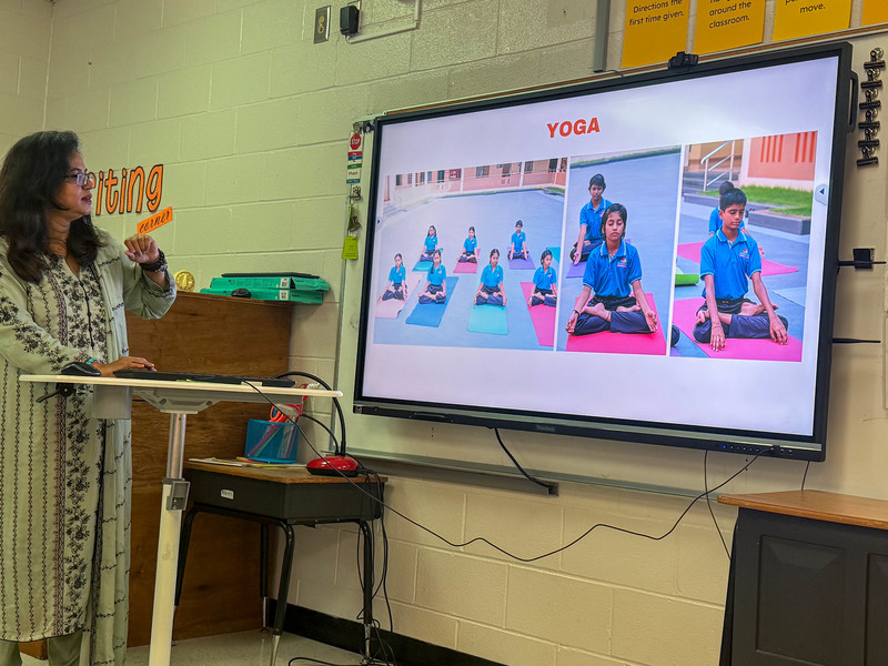 Rahmath Sultana presents a slide show during the Cultural Exchange.