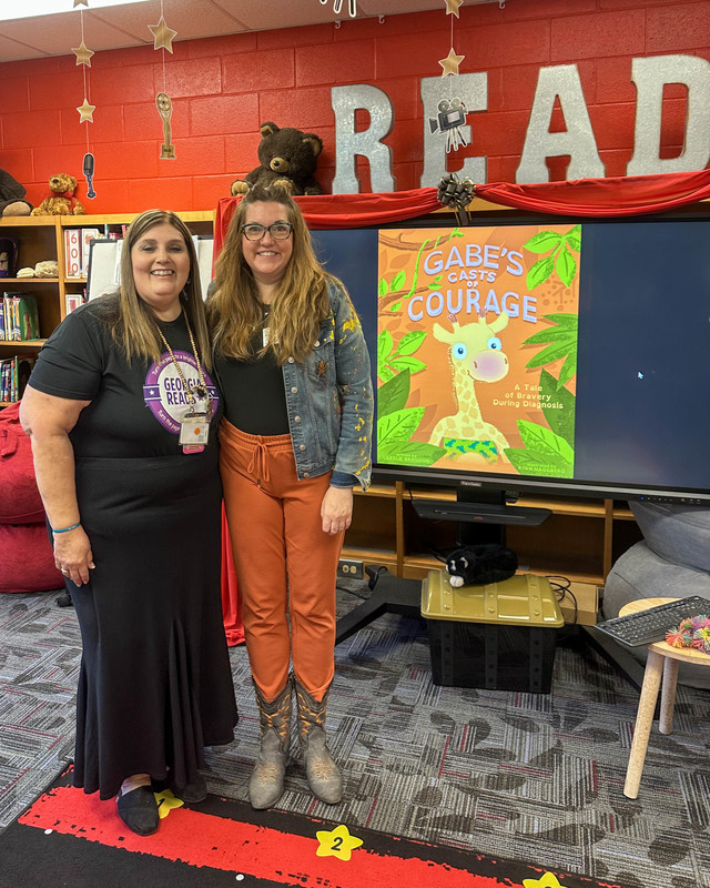 SDES media specialist Ana Leibbrand with an author for Georgia Reads Day.