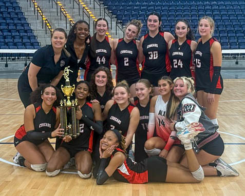 AHS volleyball team with county title trophy