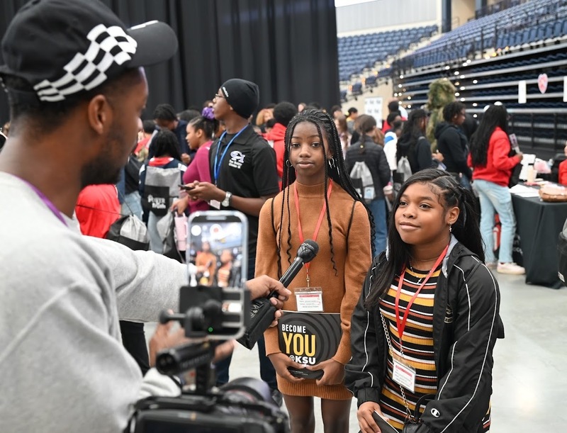 Students being interviewed on camera at Power in Truth Conference.