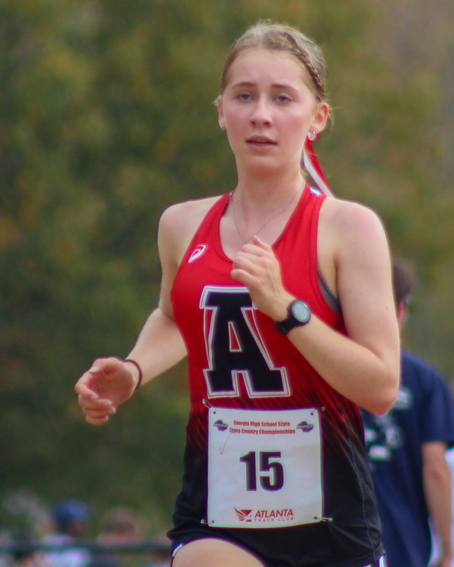 Emily McDonald runs at state