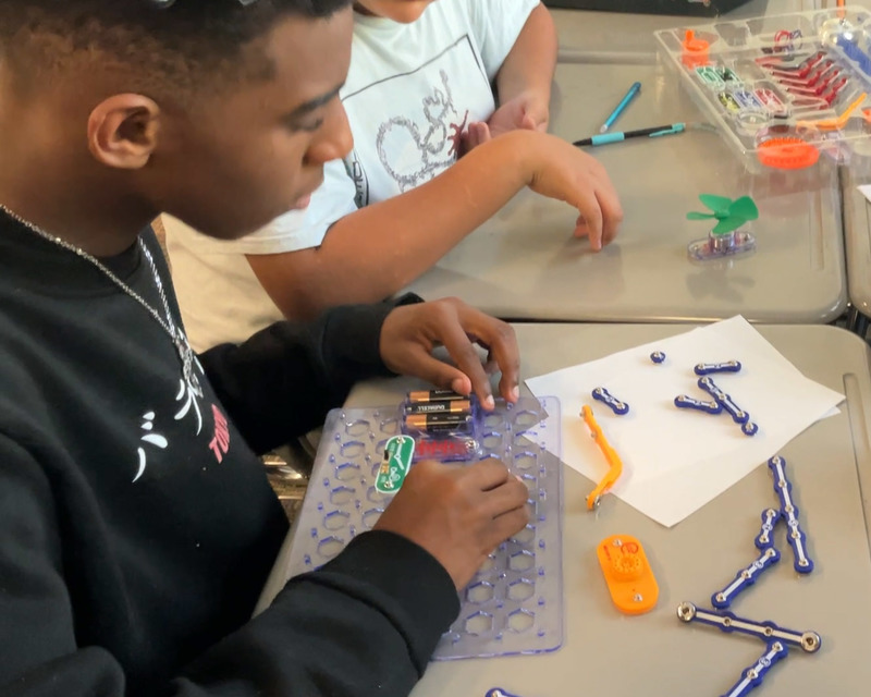 A Stewart student works on circuits in his science class.