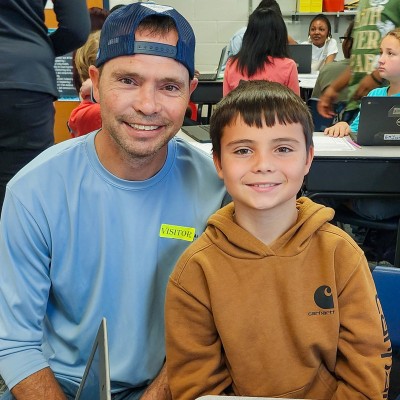 A student and his father at MAES.