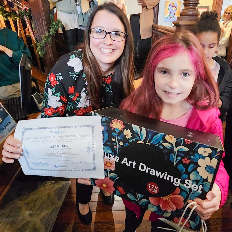 Winter Wonderland art winners with CAC Executive Director Emily Lightner.