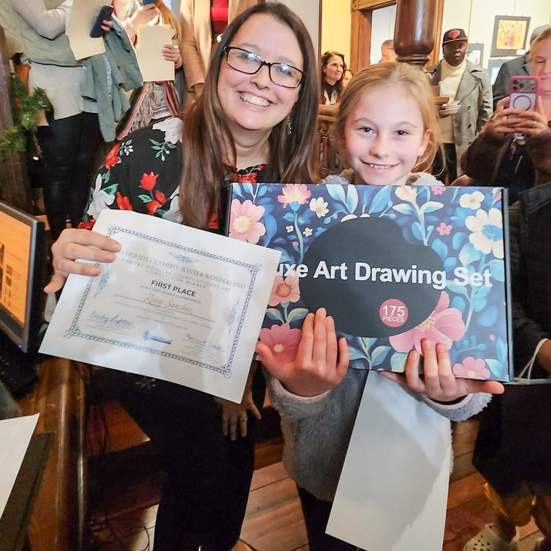 Winter Wonderland art winners with CAC Executive Director Emily Lightner.