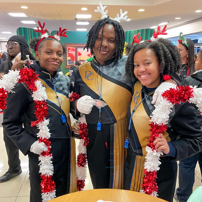 DCHS Band Members pose for a picture while at Lenox Square.