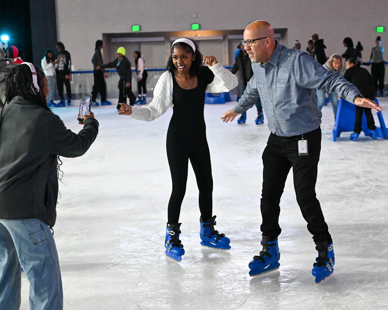 Superintendent Dr. Trent North poses with NMHS senior  Camryn Attis-Jones during Legacy on Ice 2025.