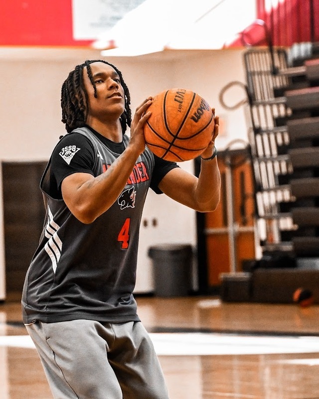 Gregory Dunson shoots a basket during practice.