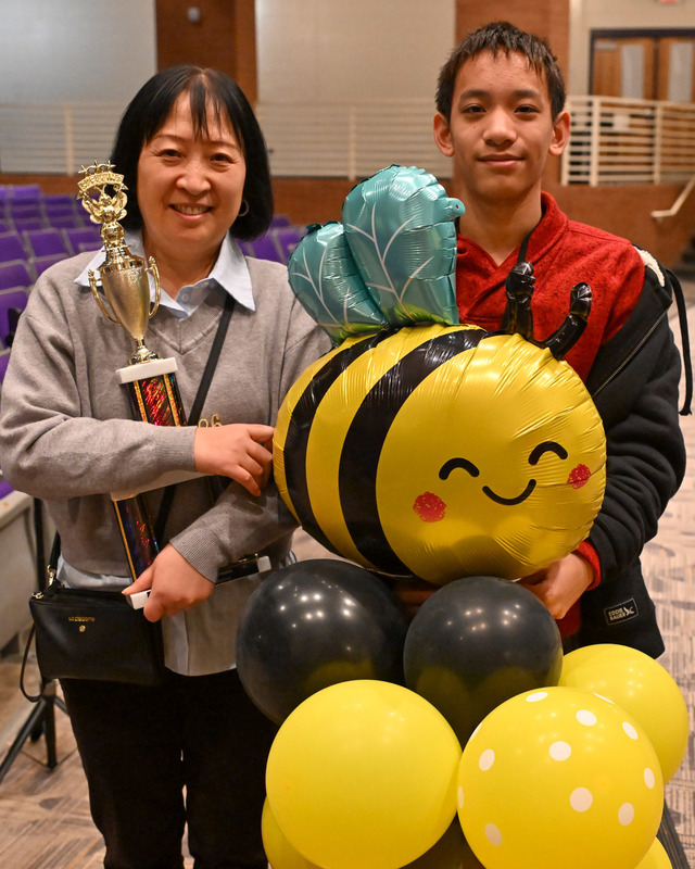 DCSS Spelling Bee winner William Liu with his mom, Jessica.