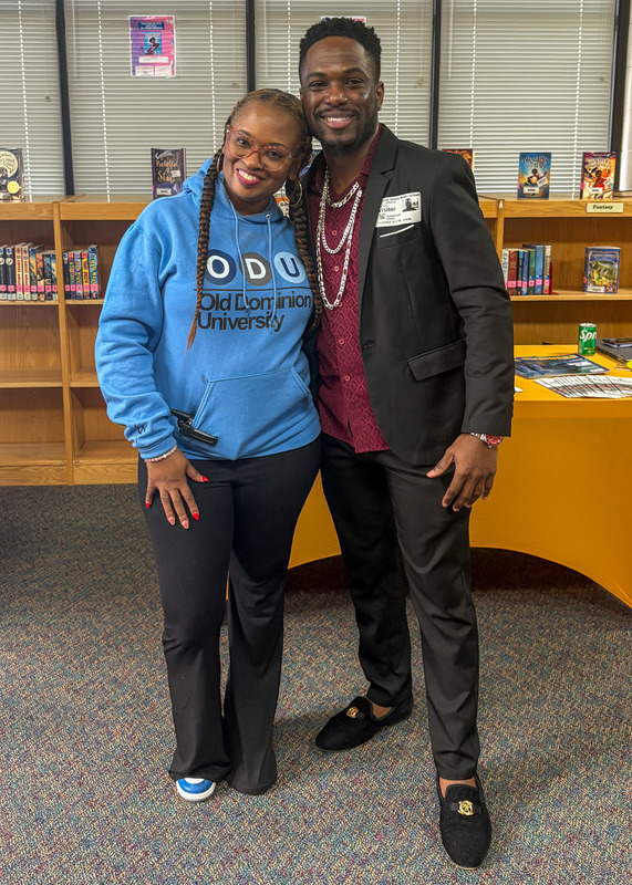 FSMS media specialist Katrina Barnett poses with a guest speaker attending the school's Career Fair.
