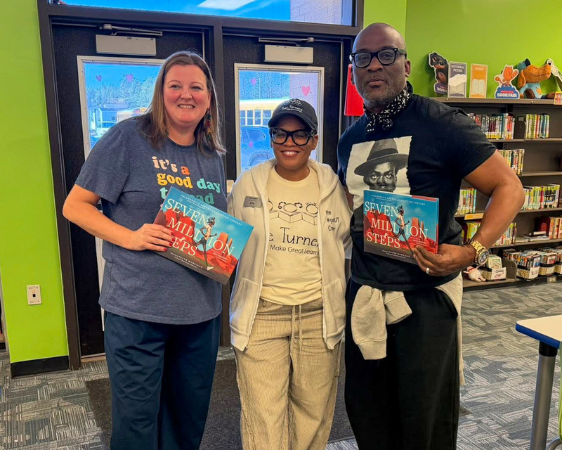Author Derrick Barnes with Media Specialist Kerry Harbin and Mrs. FeFe during a special author visit.