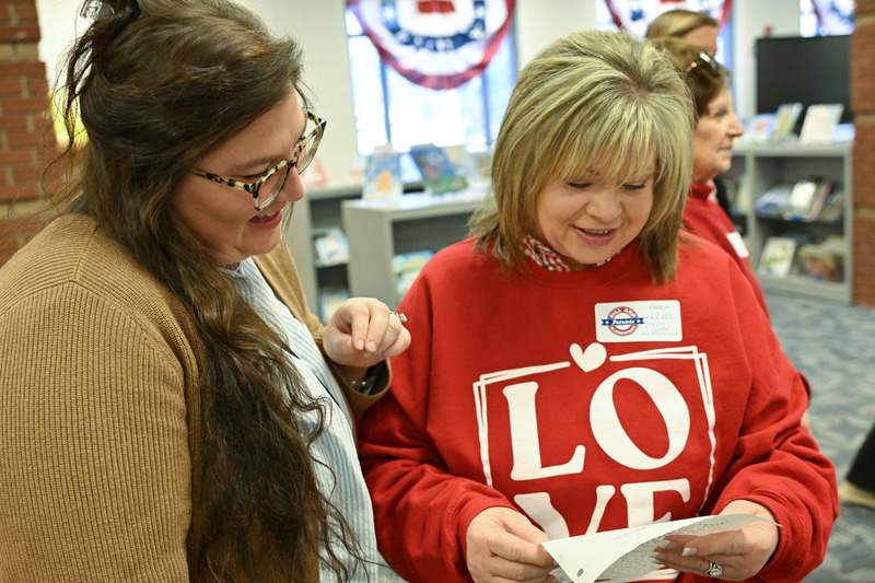 Haley Hendrix and Tammy Womack read a letter Hendrix wrote to her future self in fifth grade at Bill Arp.