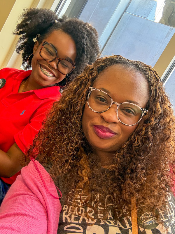 Factory Shoals Middle media specialist Katrina Barnett takes a selfie with a student during TomeCon.