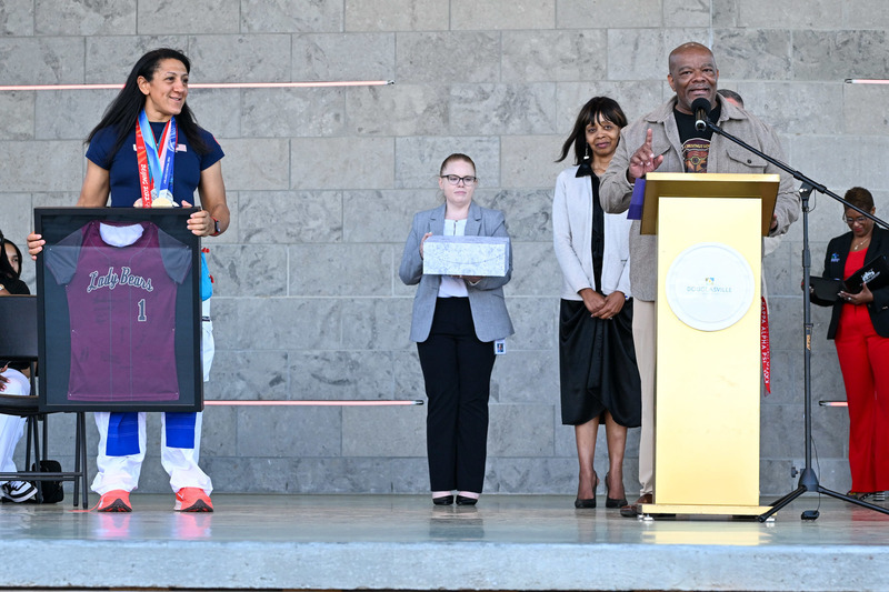 Chestnut Log Principal Daryl Holman speaks at the Elana Meyers Taylor  homecoming event.