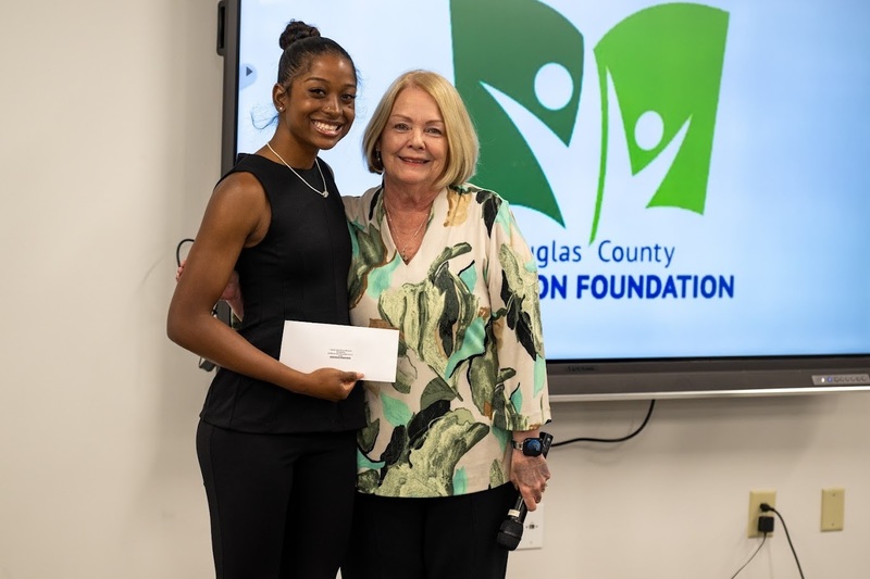 Donor Karen Emory with Captain Herb Emory Memorial Scholarship winner Jayda Young from Chapel Hill High.