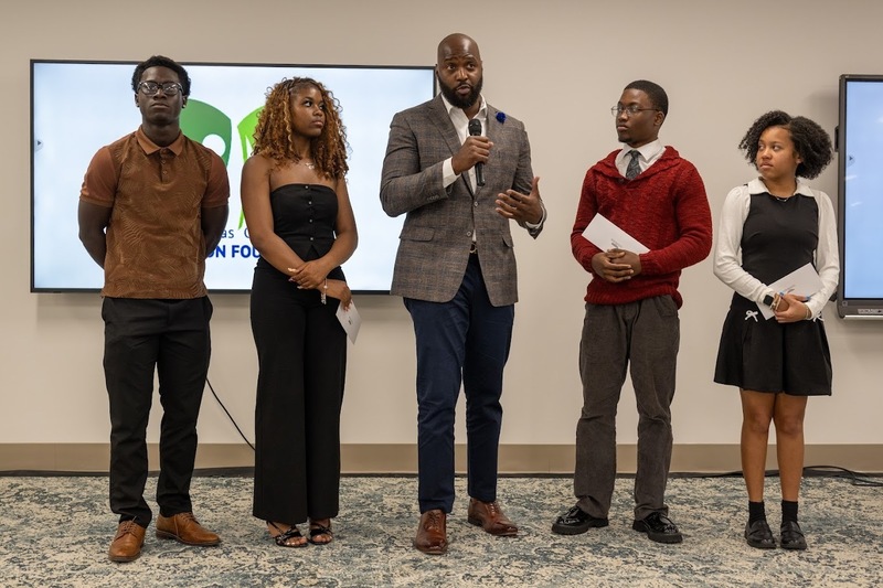 Mario West talks about his Defend the Dream scholarships with this year's awardees.