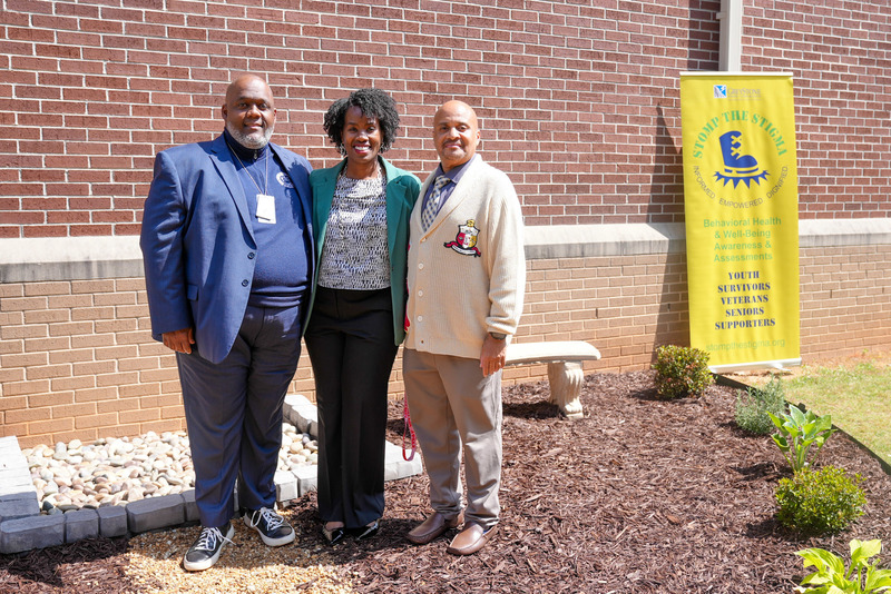 New Manchester Principal Casey Bethel with guests in the new Memorial and Wellness Garden.