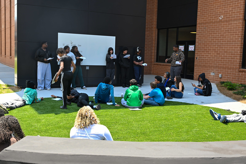 The new academic addition at Chapel Hill High includes an outdoor classroom with a whiteboard (pictured) and an amphitheater space for larger classroom groups.