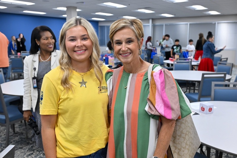 New Manchester teacher Whitney Lester with her daughter Blakely, who  will pursue a career in education.