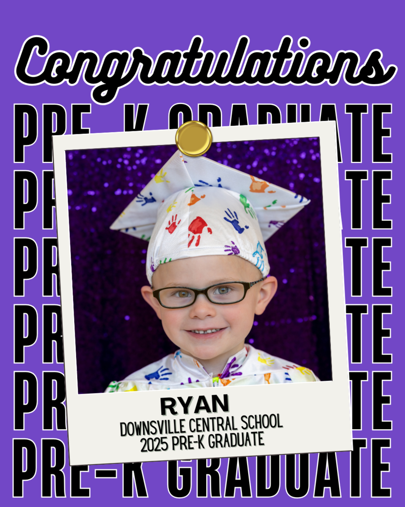 child in cap and gown
