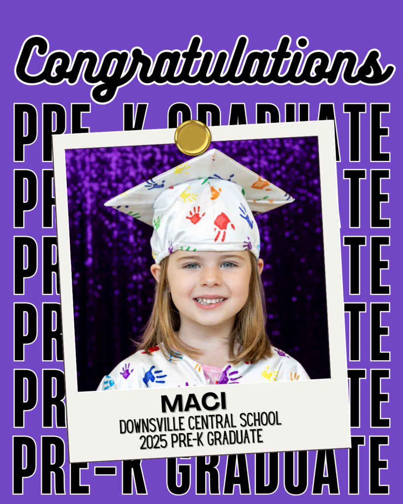 little girl in graduation cap