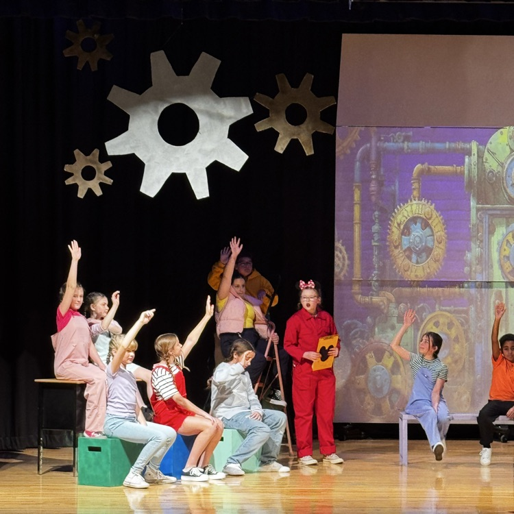 kids on stage for drama performance 