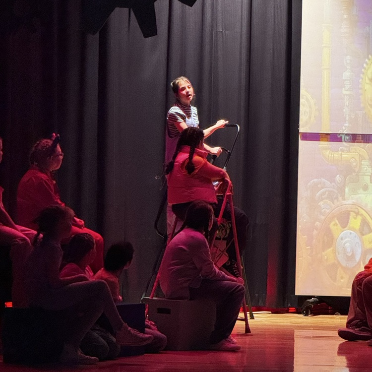 kids on stage for drama performance 