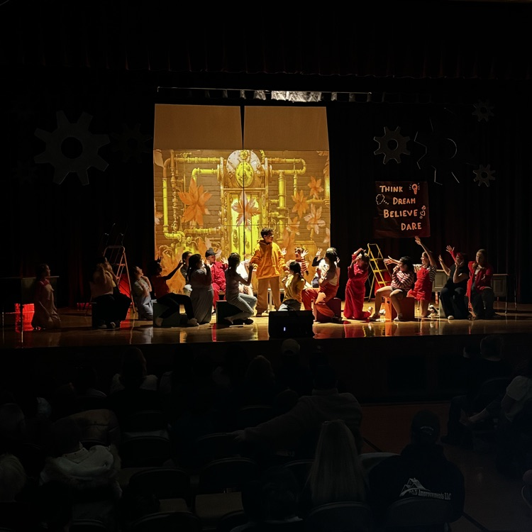 kids on stage for drama performance 