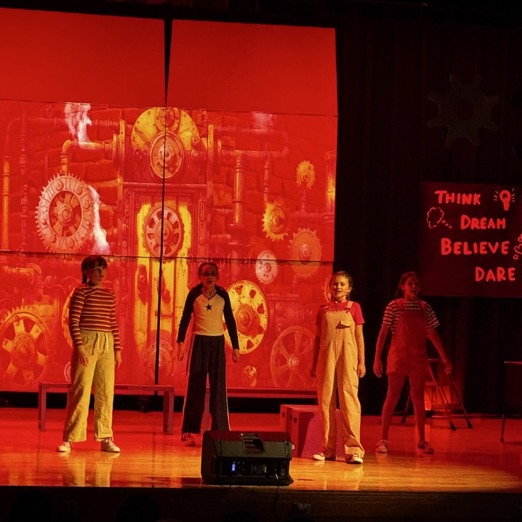 kids on stage for drama performance 