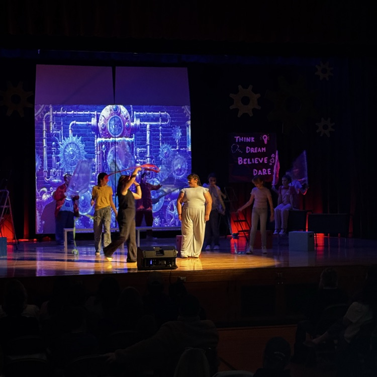 kids on stage for drama performance 
