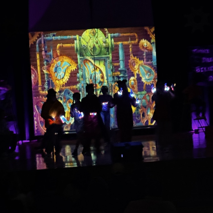 kids on stage for drama performance 