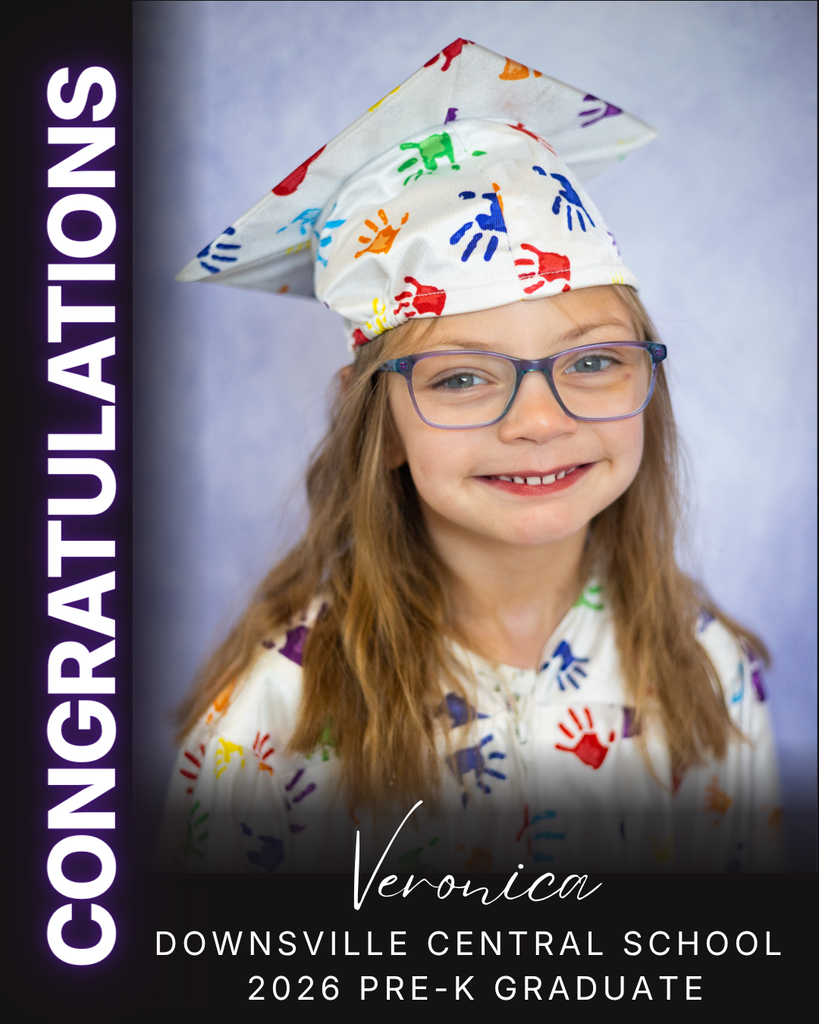 child in cap and gown